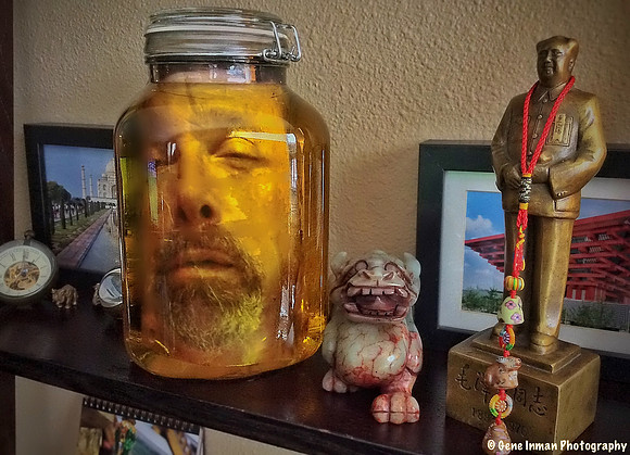 The Collector - Head in Jar